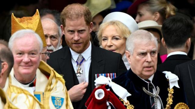 Britain's Prince Harry, Duke of Sussex, and Prince Andrew leave Westminster Abbey following the coronation ceremony of Britain's King Charles and Queen Camilla, in London, Britain May 6, 2023.