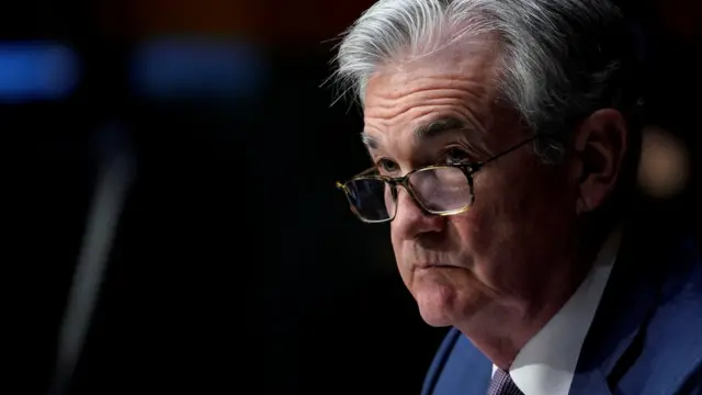 Chairman of the Federal Reserve Jerome Powell listens during a Senate Banking Committee hearing on "The Quarterly CARES Act Report to Congress" on Capitol Hill in Washington, U.S., December 1, 2020.