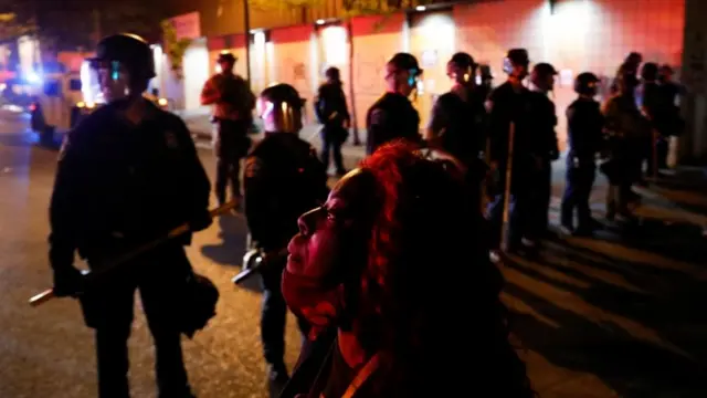 Protesters and police for Minneapolis