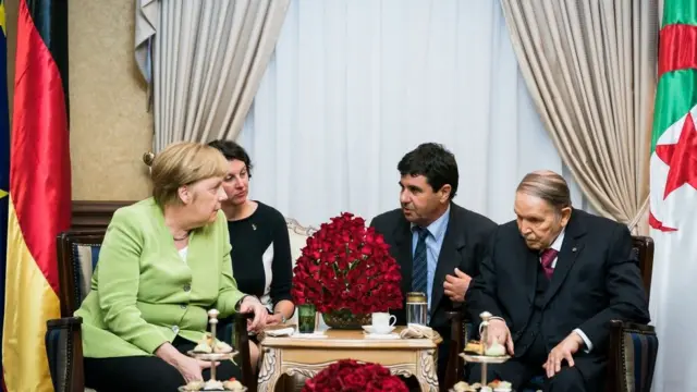 بوتفليقة وميركل