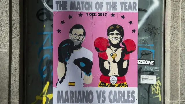 Cartel de presidente de España, Mariano Rajoy, y presidente catalán, Carles Puigdemont.