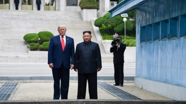 Trump and Kim in North Korea