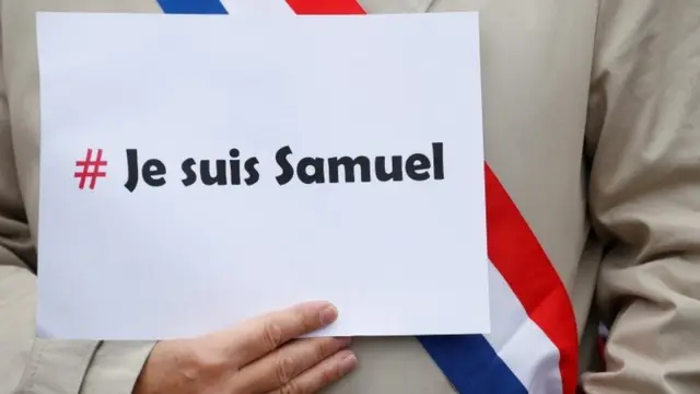 People gather in Paris for Mr Paty