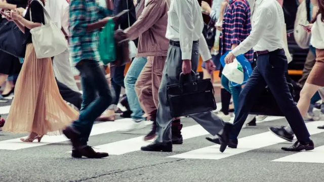 Group of people on a zebra crossing