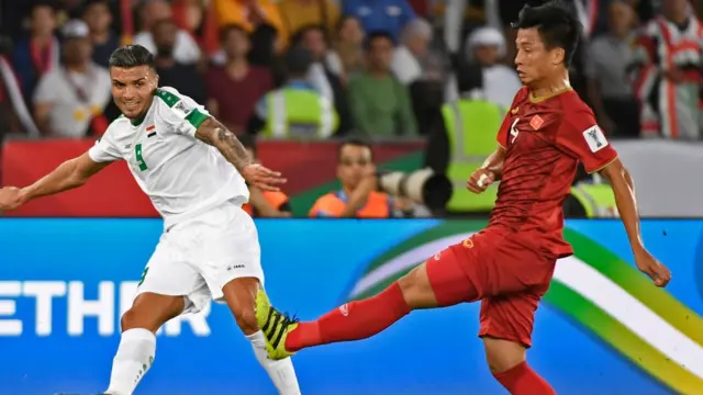 Bùi Tiến Dũng trong trận gặp Iraq hôm 8/1