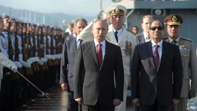 Image shows Putin onboard boat