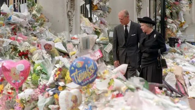 The Queen & Prince Philip view flowers laid to commemorate the death of the Princess of Wales