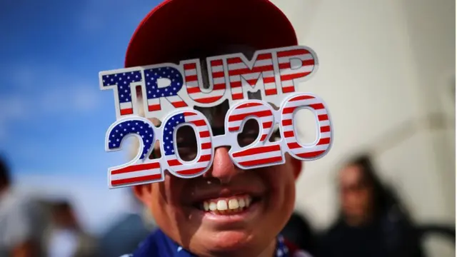 A supporter attends a campaign rally from Donald Trump Jr for U.S. President Donald Trump ahead of Election Day