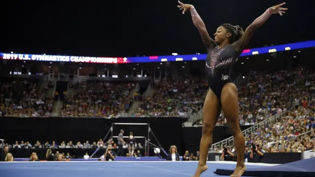 Simone Biles competes on floor exercise