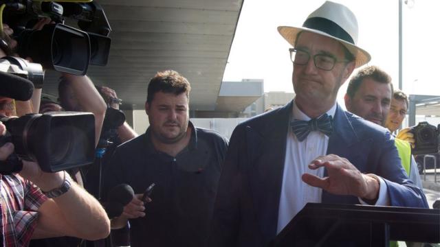 Spanish lawyer Juan de Dios Crespo, a specialist in sports and in charge of depositing, in the name of PSG, the 222 million euro buyout clause written into Brazilian forward Neymar"s contract, leaves Barcelona"s airport, on August 3, 2017