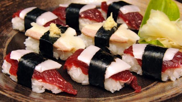 Whale sushi made with sliced minke meats and blubber, at a sushi shop