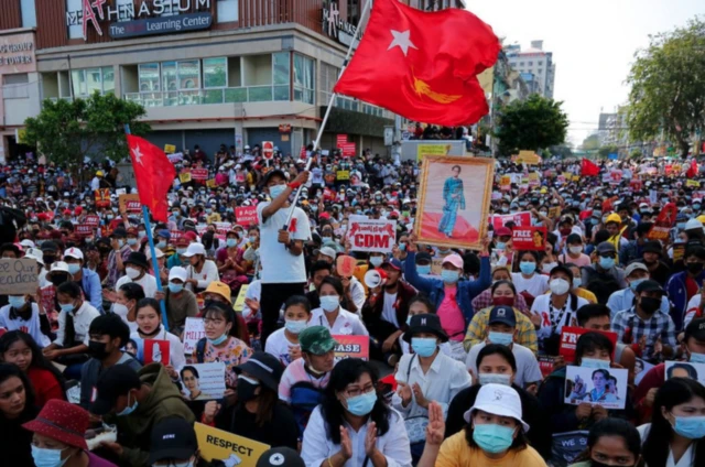 Myanmar protesters take part in a demonstration against the military coup near Sule Pagoda in central Yangon, Myanmar on 17 February 2021