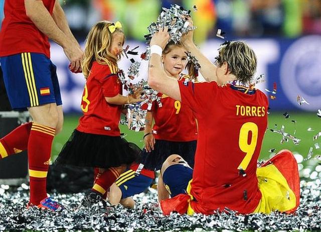 Torres celebrates with his children