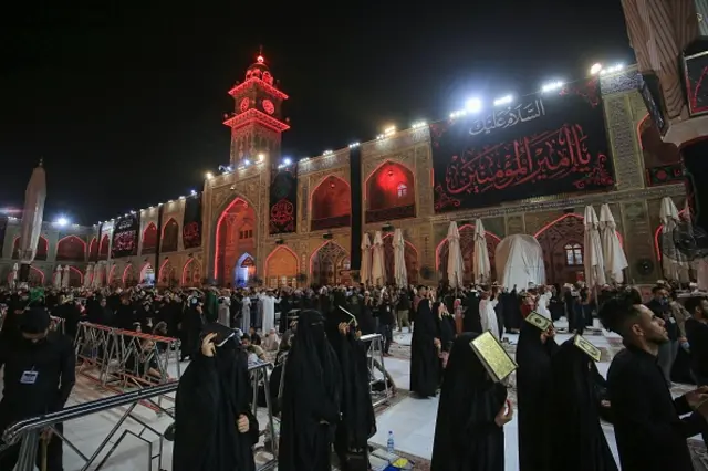 Worshippers take part in prayer rituals of Laylat al-Qadr (Night of Destiny) which marks the night in which the holy Koran was first revealed to the Prophet Mohammed, at the Imam Ali shrine in the Iraqi city of Najaf, on May 1, 2021. (Photo by Ali NAJAFI / AFP) (Photo by ALI NAJAFI/AFP via Getty Images)