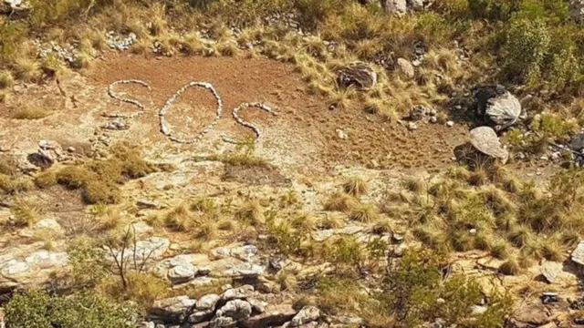 SOS Avustralya işareti