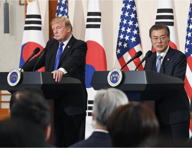 South Korean President Moon Jae-in (R) and US President Donald J. Trump (L) hold a joint press conference at the presidential office Cheong Wa Dae in Seoul, South Korea, 07 November 2017. The two leaders reaffirmed their resolve to peacefully end North Korea"s nuclear and ballistic missile development. Trump is on a two-day official visit to South Korea, the second stop on his 12 day tour of Asia. EPA/KIM MIN-HEE / POOL