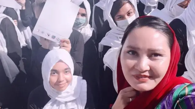 Roshan with school kids