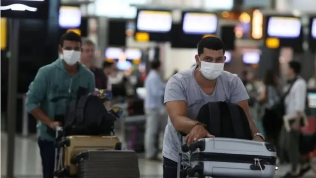 Passageiros no aeroportof12bet aviatorGuarulhos