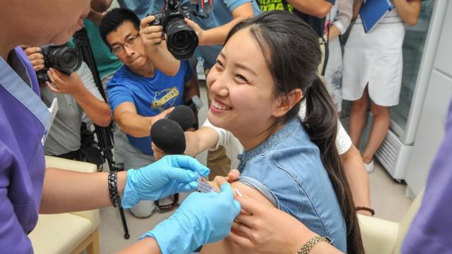 Chinese woman being vaccinated for HPV