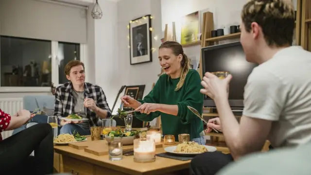 People having dinner at home
