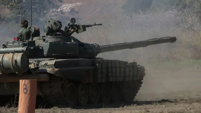 Handout picture released by the Venezuelan presidency showing a Russian-made T72 tank taking part in military exercises at Fort Paramacay in Naguanagua, Carabobo State, Venezuela, on January 27, 2019