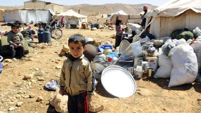 صورة أرشيفية للاجئين سوريين في مخيم في لبنان