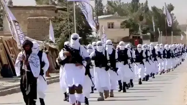 Taliban forces parade in Qalat, Zabul province, image taken from social media video, 19 August 2021