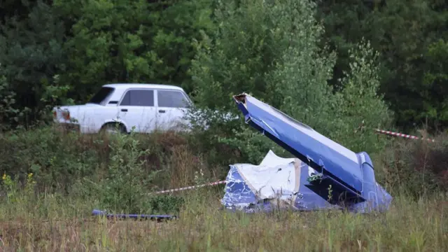A wreckage of the private jet linked to Wagner mercenary chief Yevgeny Prigozhin is seen near the crash site in the Tver region