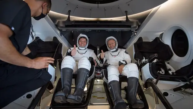 Nasa SpaceX crew dragon splashdown video: Bob Behnken (L) and Doug Hurley (R)
