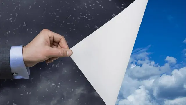 Mano cambiando el clima