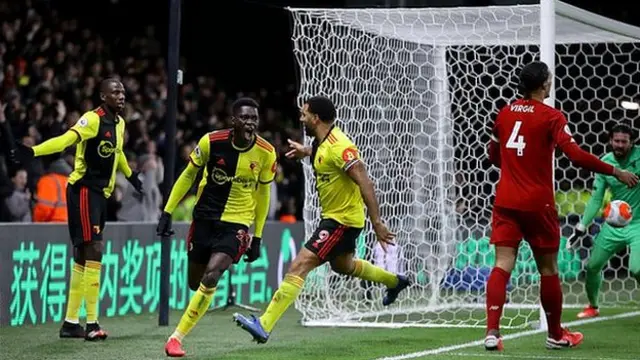 Ismaila Sarr celebrates scoring against Liverpool