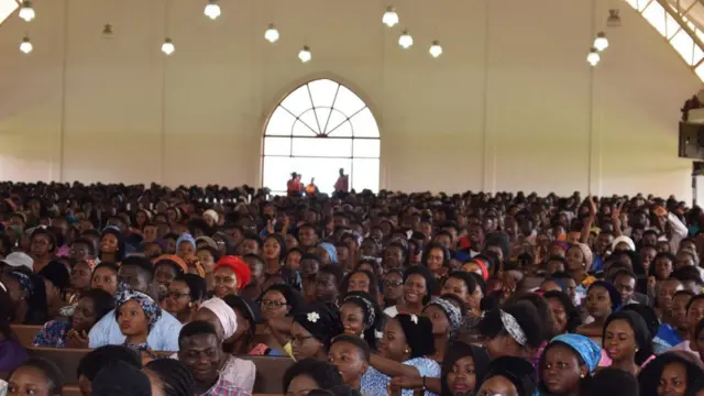 Students inside chapel for di school.
