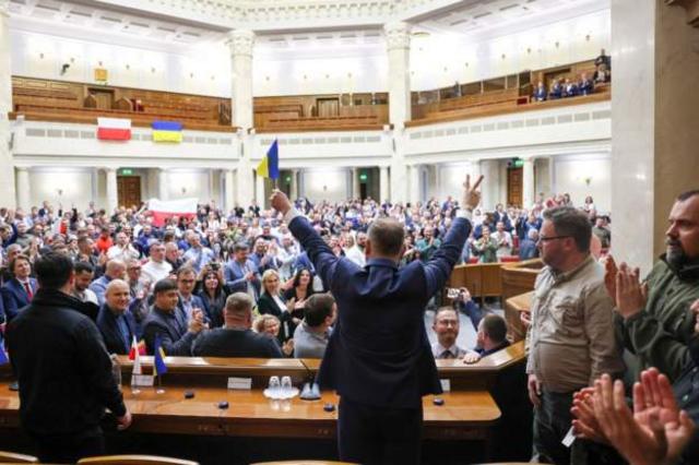 The Polish leader was given a standing ovation for his address in Ukraine's parliament