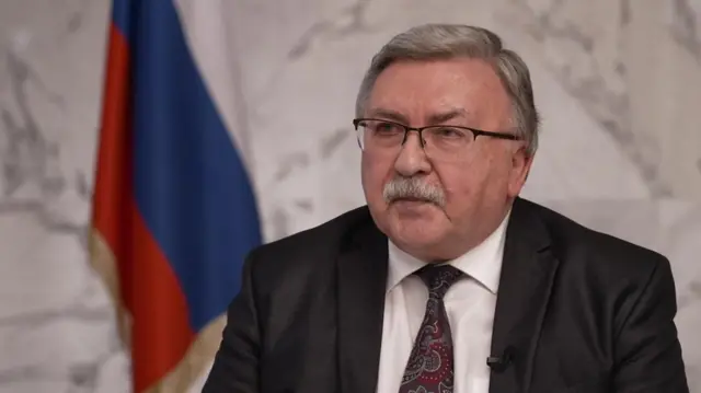 اولیانوف تأکید کرد که روسیه تحولات اخیر را متفاوت از چند ماه پیش نمی‌بیند و افزایش هشدارهای مدیرکل آژانس را ناشی از «فشارهای سیاسی» دانست