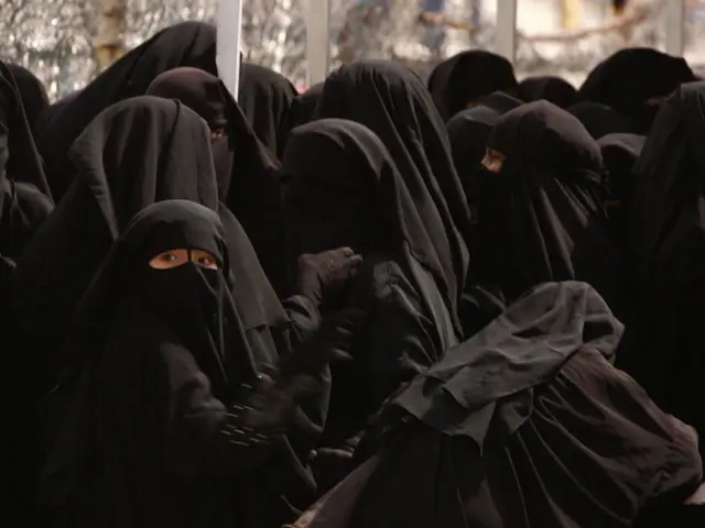 Women in black niqab at al-Hol camp