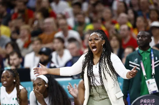 Nigeria's US coach Rena Wakama reacts in the women's preliminary round group B basketball match between Nigeria and Australia during the Paris 2024 Olympic Games at the Pierre-Mauroy stadium in Villeneuve-d'Ascq, northern France, on July 29, 2024.