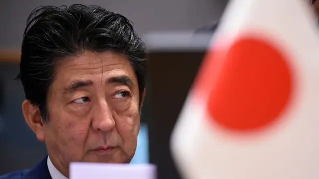 Japan's Prime Minister Shinzo Abe looks on ahead of a Asia Europe Meeting (ASEM) at the European Council in Brussels on October 19, 2018.