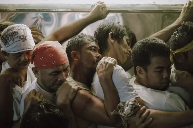 Men in a religious procession