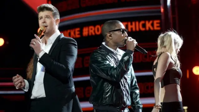 Поп-виконавці Фарелл Вільямс і Робін Тік