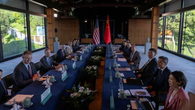 Wang Yi, the director of the Communist Party's Central Foreign Affairs Commission Office and White House National Security Adviser Jake Sullivan pose for a photo before talks at Yanqi Lake in Beijing, China, August 27, 2024