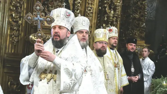 Священники