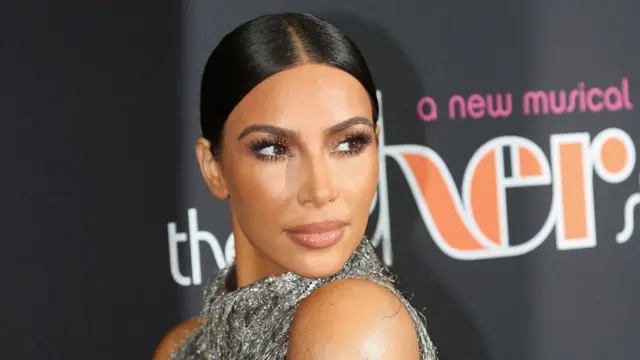 Kim Kardashian posing at a music launch