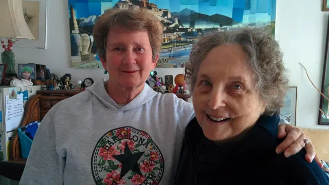 Laura (left) photographed with fellow-survivor Claire Janaro