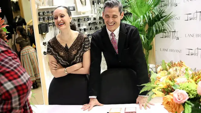 Isabel and Ruben Toledo laughing at an event in 2015