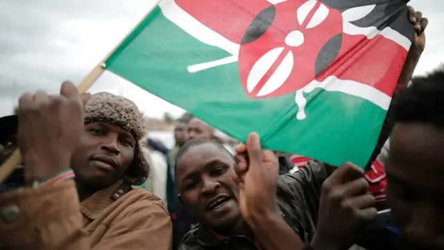 Kenyans dey street dey carry flag