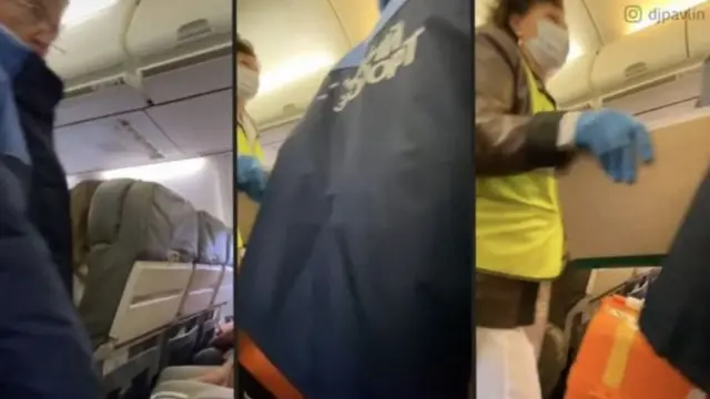 Sağlıkçılar Navalni'yi sedye ile ambulansa götürdü