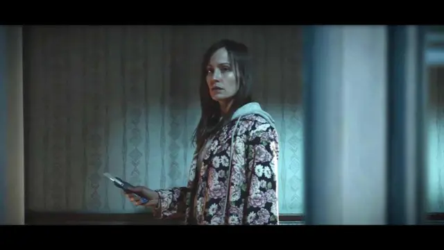 Жінка у вікні