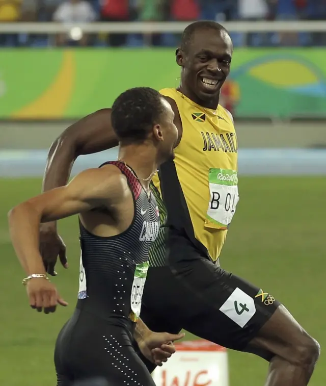 Bolt y De Grasse.