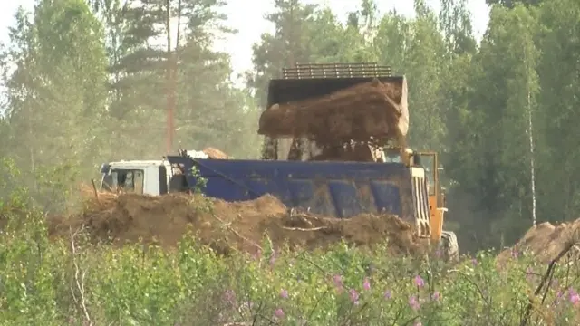 Добыча песка на карьере в Ленинградской области