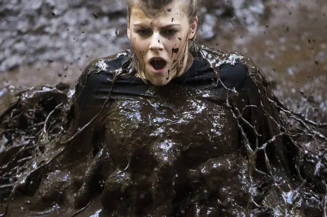 A contestant in The Muddy Trials